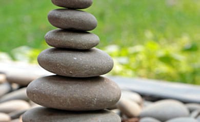 river rocks stacked on top of each other