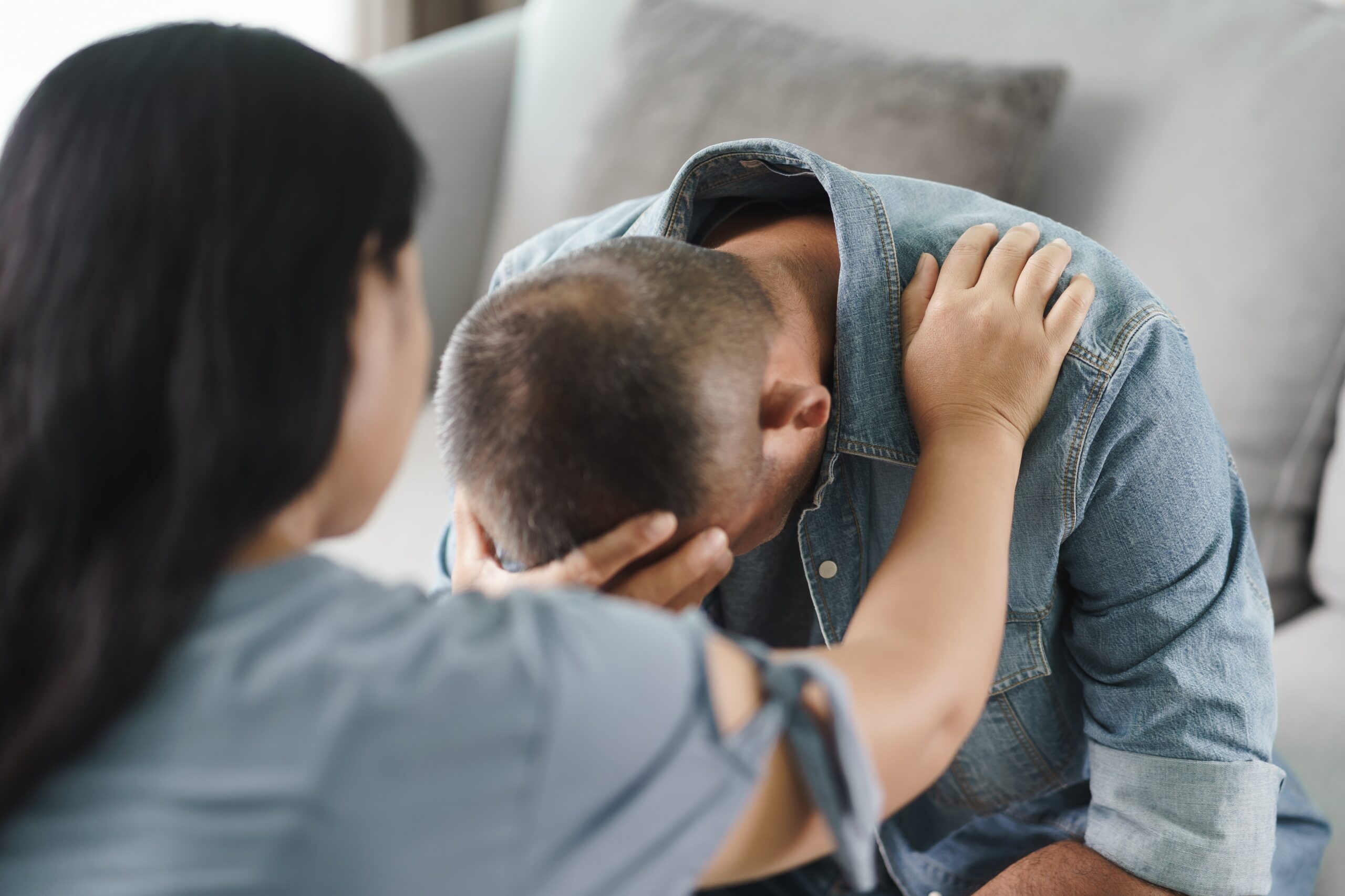 Young man getting help from a mental health professional.