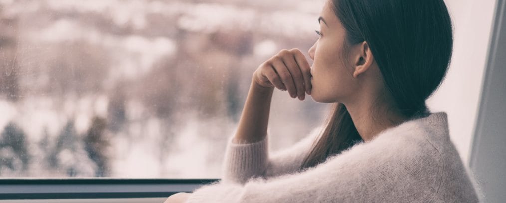 Isolated woman with seasonal depression.