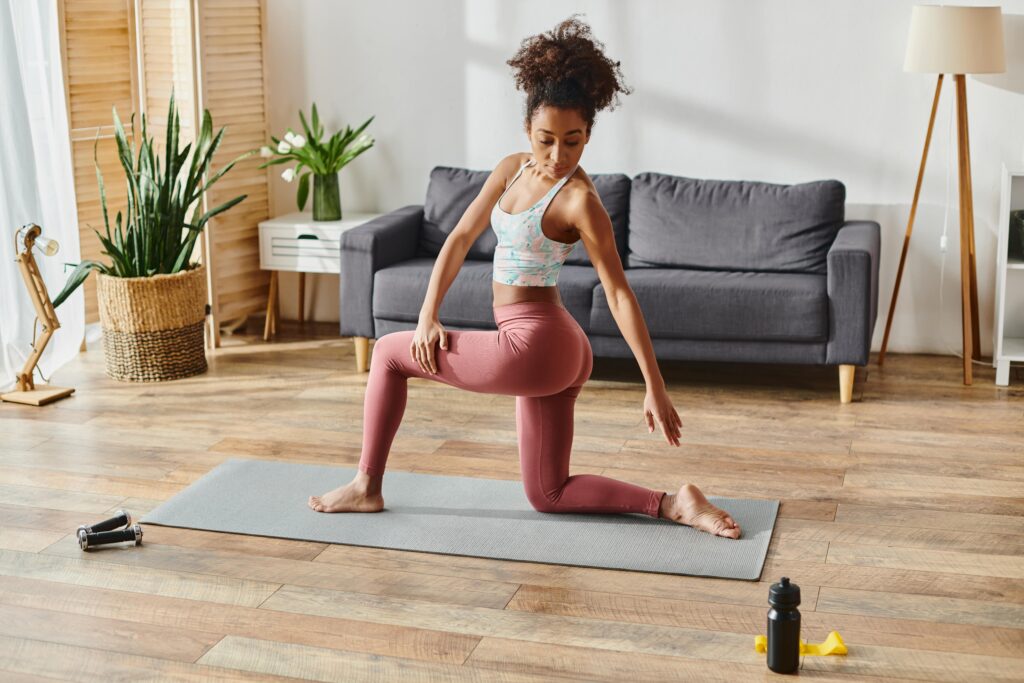 Woman doing yoga in her apartment.