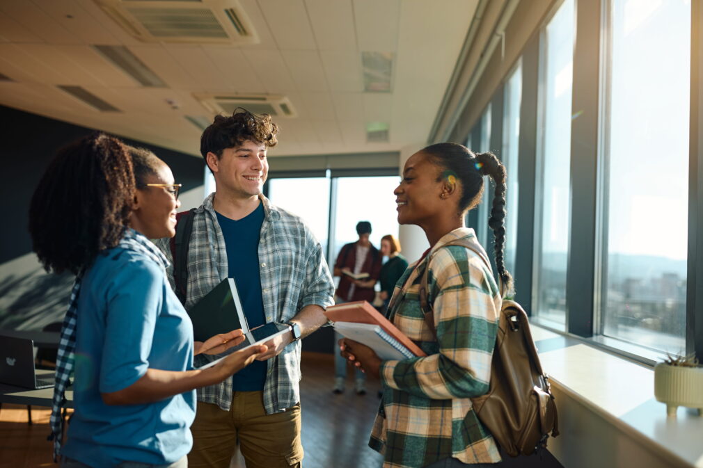 College students talking together after class.