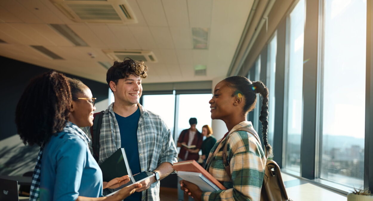 College students talking together after class.