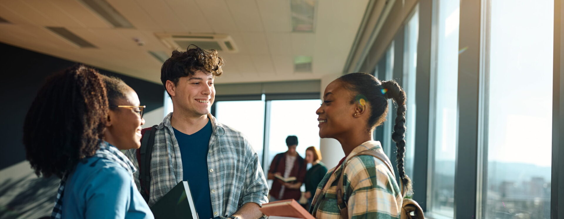 College students talking together after class.
