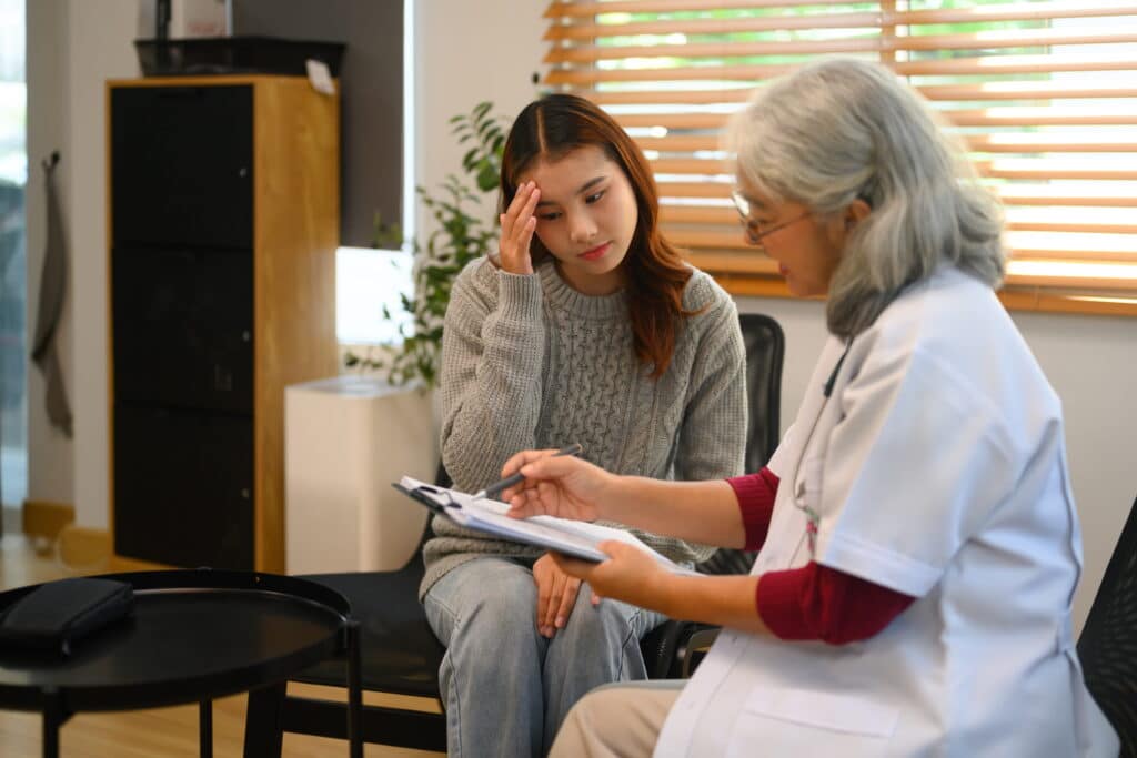 College student speaking to a mental health professional.