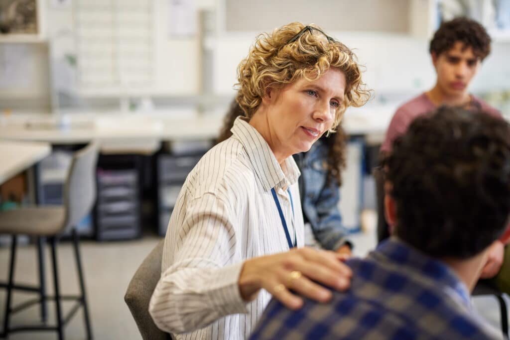 Mental health professional comforting a patient.