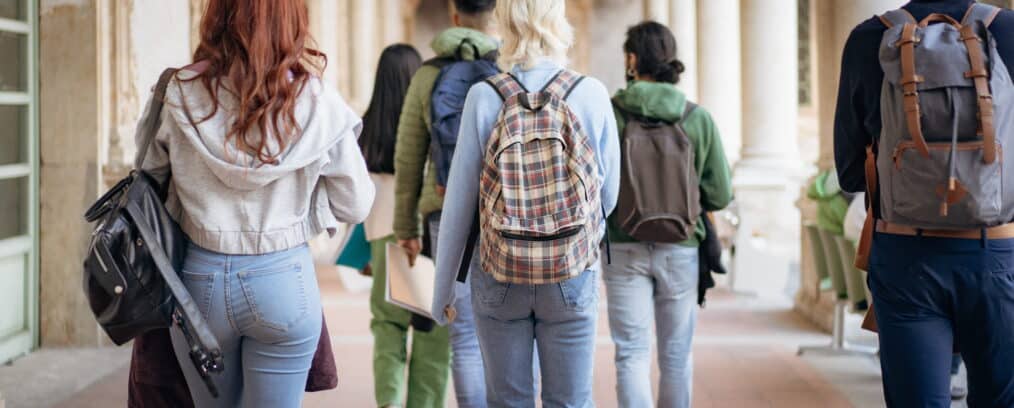 Group of students walking to class together.